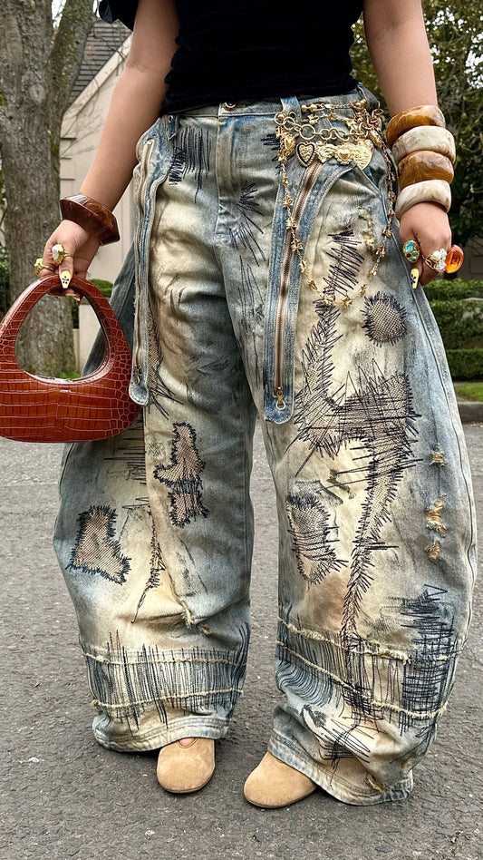 Curved Blade Embroidered Denim Jeans